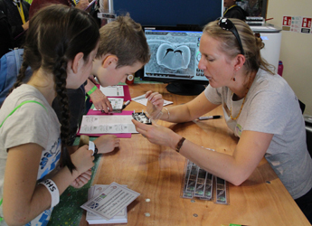 School pupils learning about our science